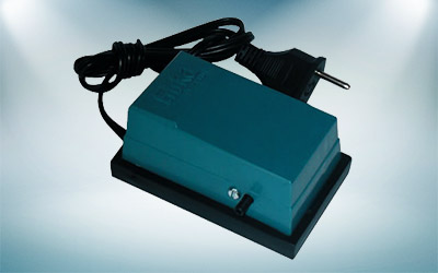 Compressor Friska Standard em fundo iluminado